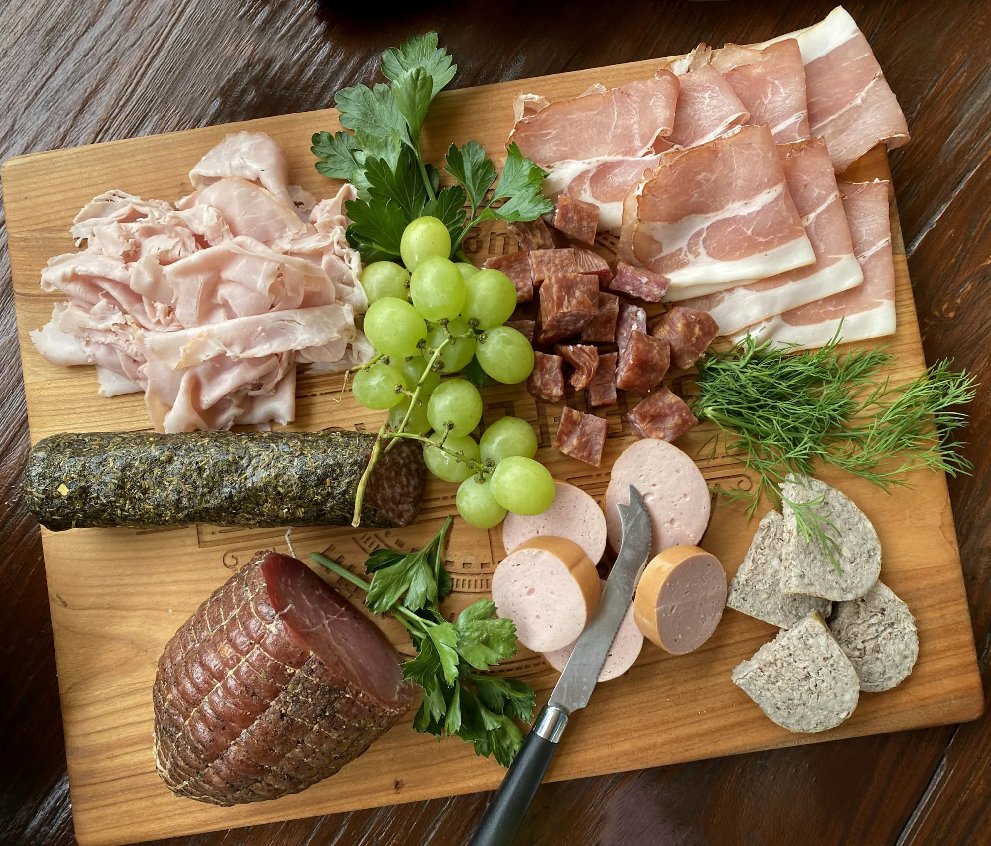 Cold cuts and sausages on a board
